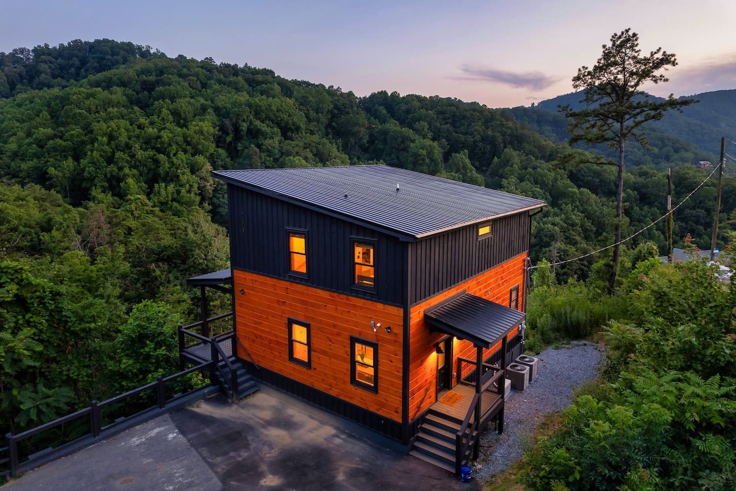 Sugar Splash cabin exterior with mountain backdrop