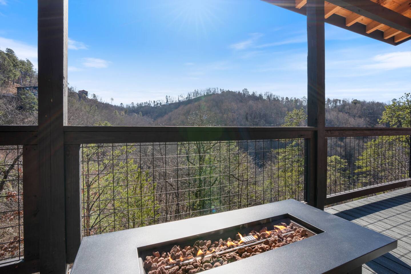 Gas fire pit on the deck overlooking rolling mountain views